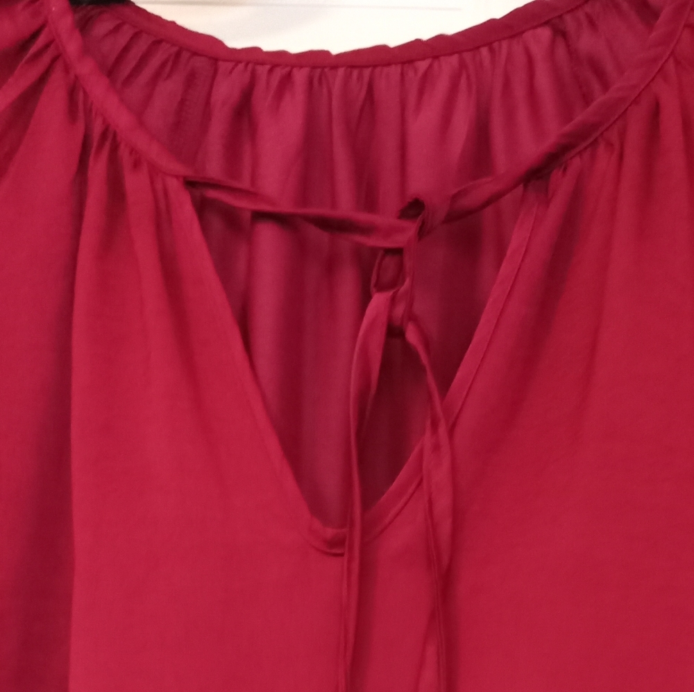 Beautiful wine silky long sleeve top. Size medium